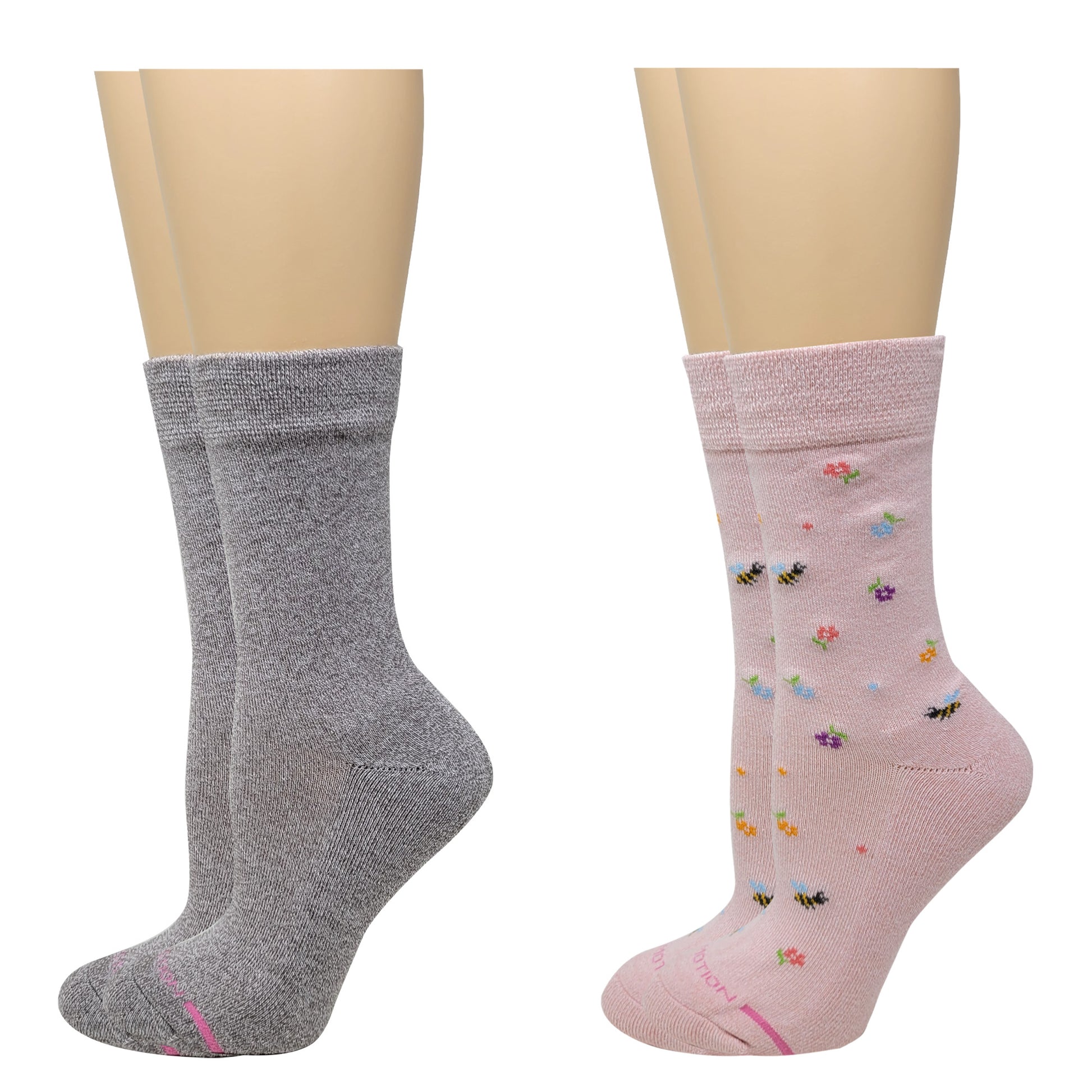 Gray and pink socks on mannequin feet with floral patterns.