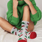 Festive Christmas cozy socks with grip bottoms – perfect holiday gift idea