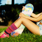 Women’s crew socks with rainbow and colorful stripe designs”